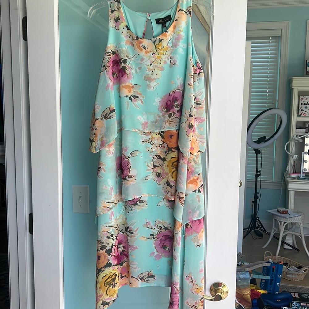 Beautiful floral 3 tier sheer layers  with a handkerchief bottom size S